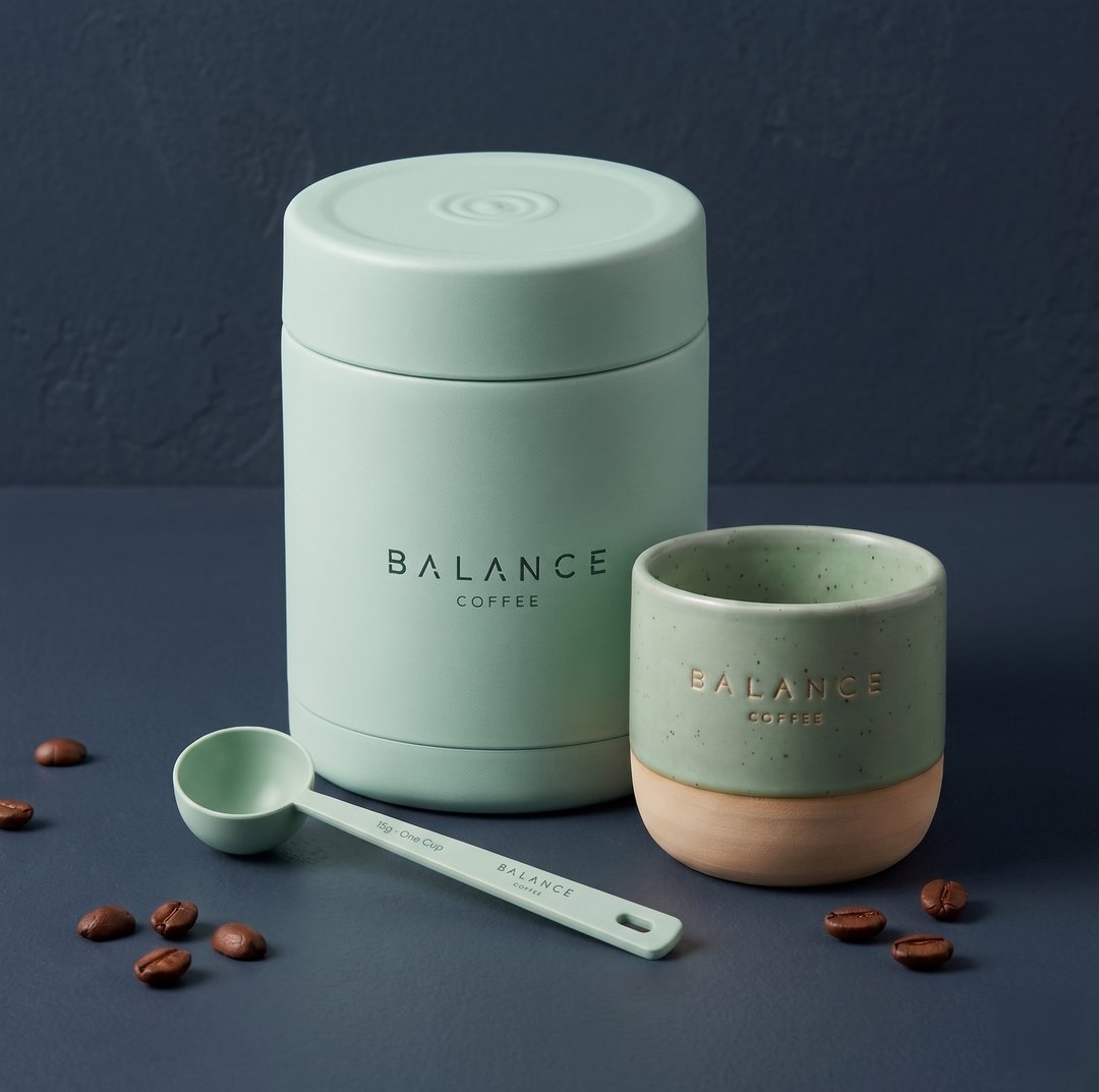 Balance storage canister, ceramic cup and measuring scoop