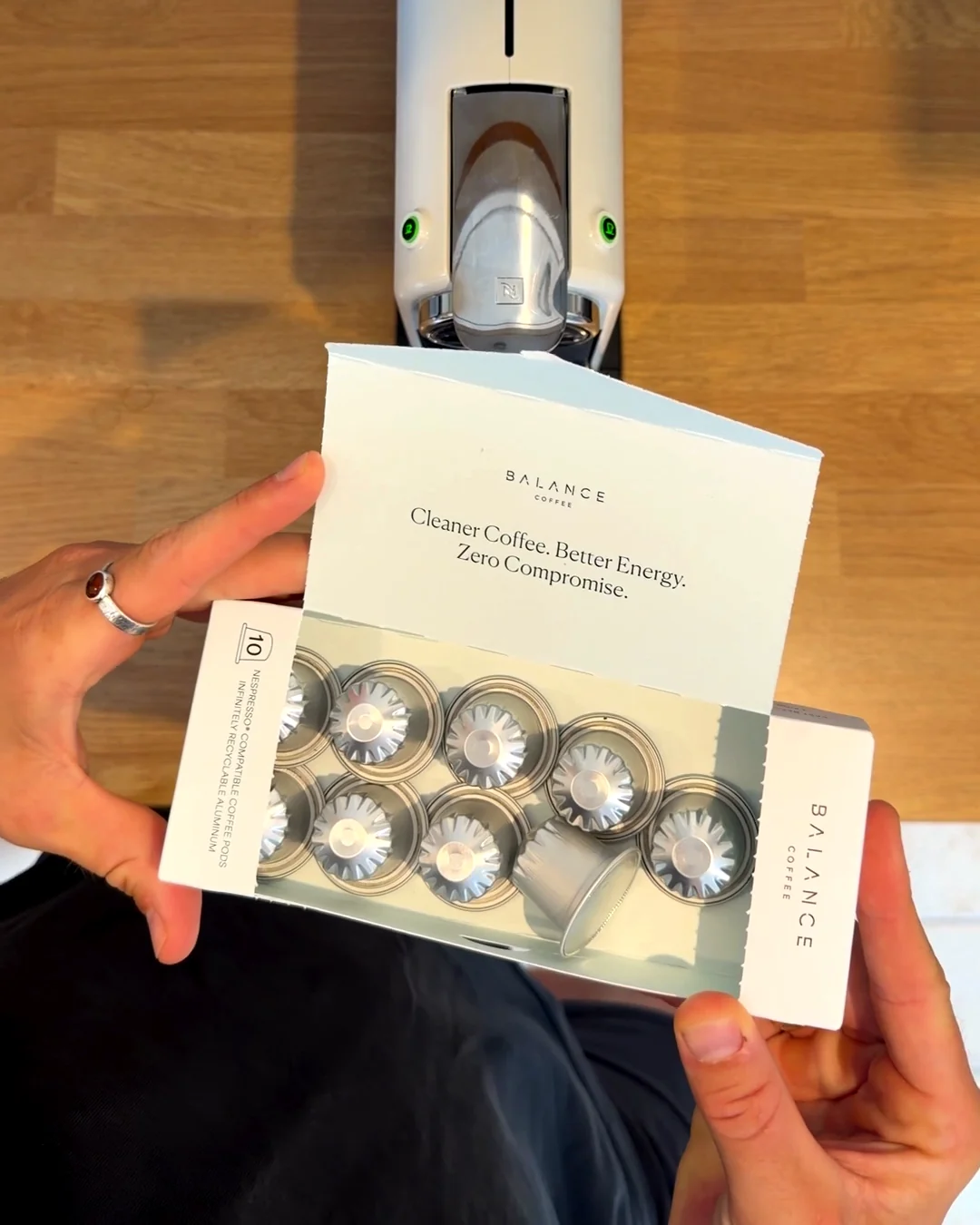 An open box of aluminium Clean Coffee Pods