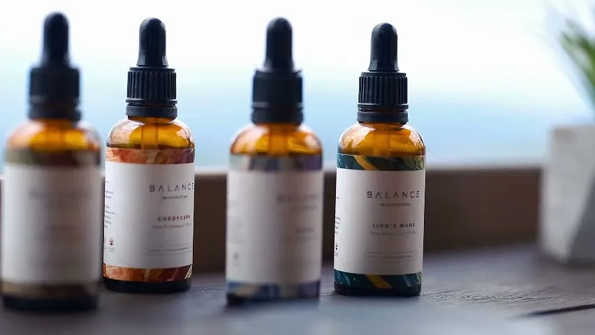 Balance mushroom elixir bottles